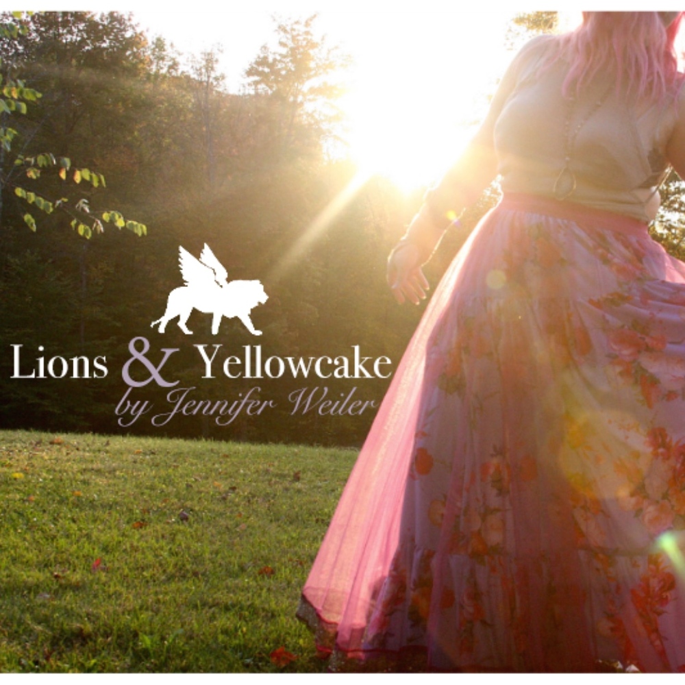 Lions & Yellowcake by Jennifer Weiler